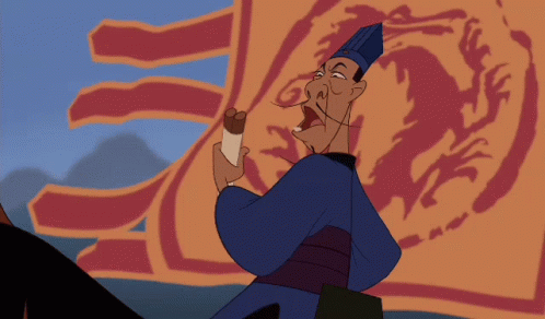 A Cartoon Character With A Blue Hat Stands In Front Of A Large Orange Flag GIF