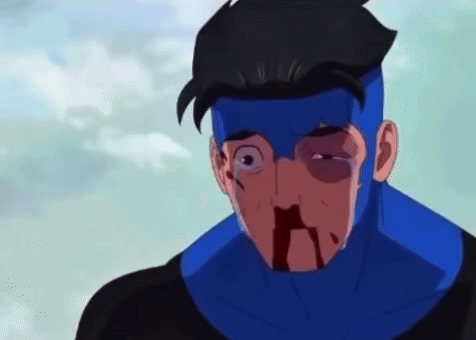 A Cartoon Character With A Blue Mask On His Face Is Bleeding From His Nose . GIF