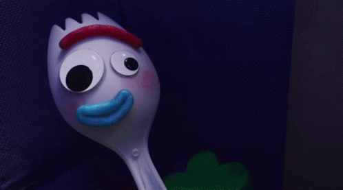 A Cartoon Character With A Blue Mouth And Big Eyes GIF
