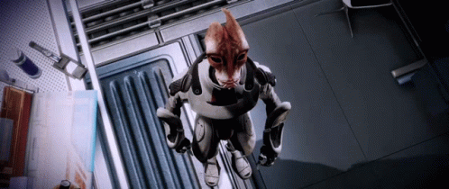 A Cartoon Character With A Cat 'S Head Is Standing In A Dark Room GIF