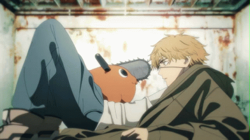 A Cartoon Character With A Chainsaw On His Knee GIF