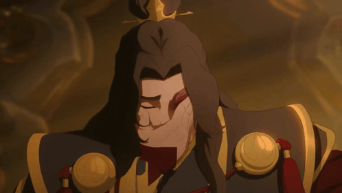 A Cartoon Character With A Crown On His Head Is Covering His Face With His Hand GIF