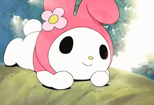 A Cartoon Character With A Flower On Her Head Is Laying Down GIF