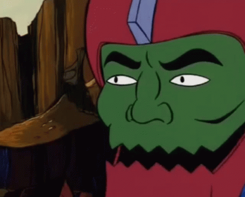 A Cartoon Character With A Green Face And A Red Helmet On GIF