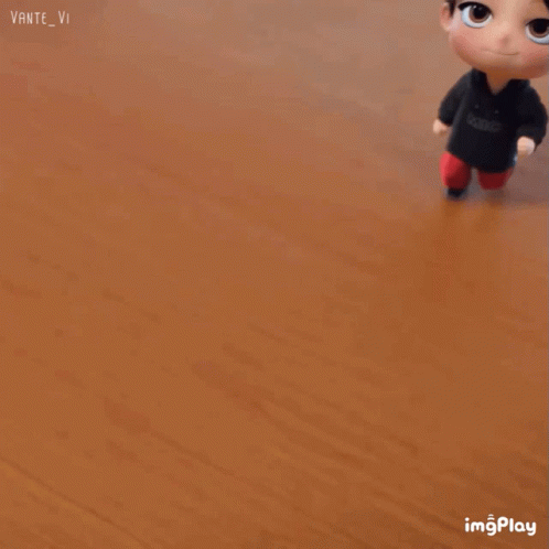 A Cartoon Character With A Headband On His Head Is Standing On A Wooden Floor .. GIF