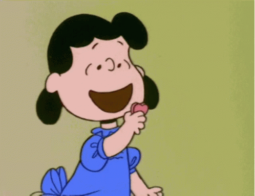 A Cartoon Character With A Heart In Her Hand GIF