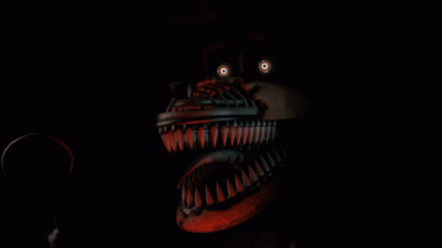 a cartoon character with a large mouth and teeth