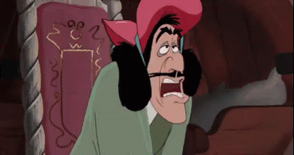 A Cartoon Character With A Pink Hat And Mustache Is Sitting In A Chair With His Mouth Open . GIF