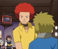 A Cartoon Character With A Red Afro Stands Next To Another Character With Green Hair GIF