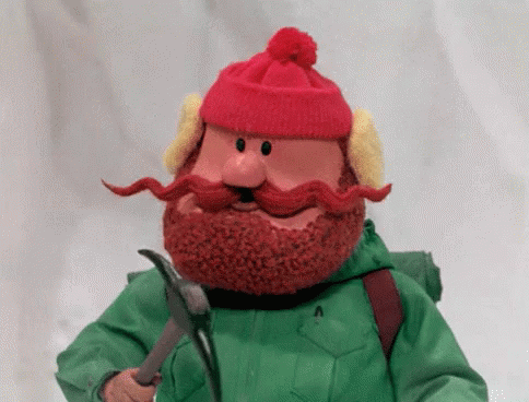 A Cartoon Character With A Red Beard And A Red Hat Is Holding A Hammer GIF