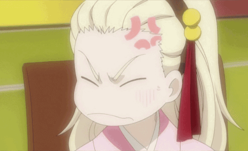 a cartoon character with a red circle on her forehead looks angry