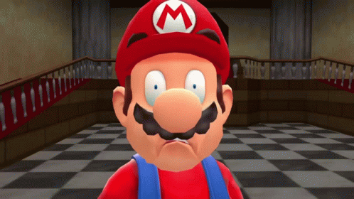 A Cartoon Character With A Red Hat And A White Letter M On It GIF