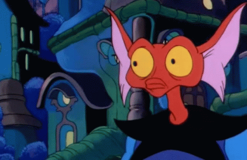 A Cartoon Character With A Red Head And Yellow Eyes Stands In Front Of A Building GIF