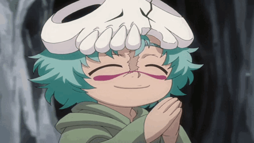 A Cartoon Character With A Skull On Her Head Is Smiling GIF