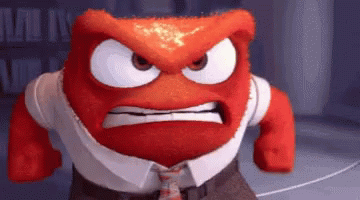 A Cartoon Character With A Very Angry Face Is Wearing A White Shirt And Tie GIF