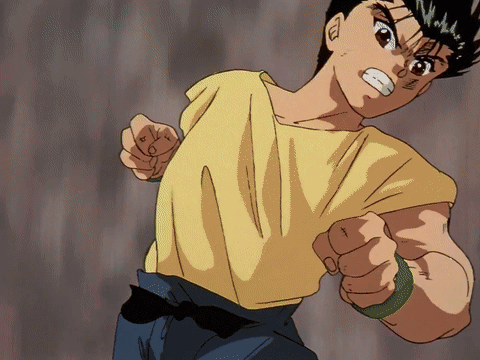 A Cartoon Character With A Yellow Shirt And Black Belt Is Making A Fist GIF