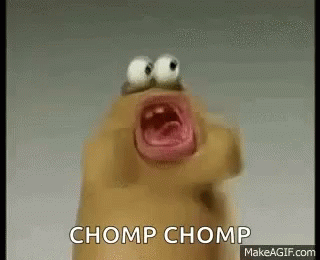 A Cartoon Character With Big Eyes Is Screaming With The Words Chomp Chomp Written On The Bottom . GIF