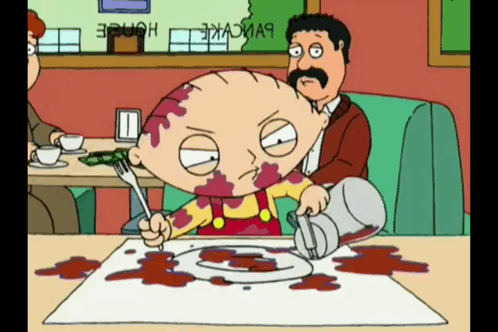 a cartoon character with blood on his face is sitting at a table with a plate of food on it