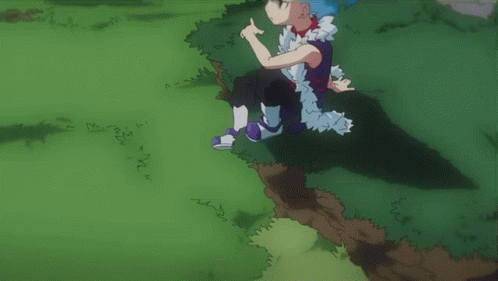 A Cartoon Character With Blue Hair Is Sitting In A Grassy Area GIF
