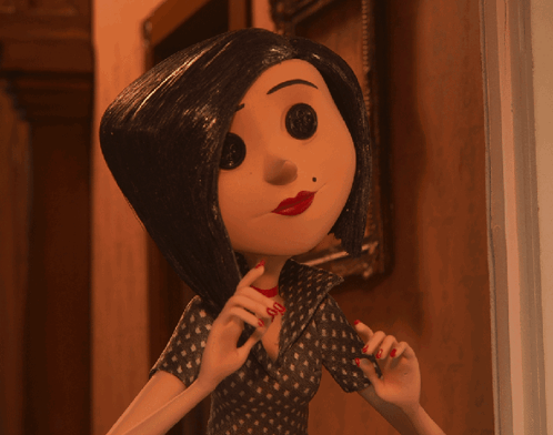 A Cartoon Character With Braces On Her Teeth GIF