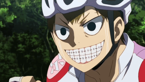A Cartoon Character With Braces On His Teeth Is Wearing A White Helmet GIF