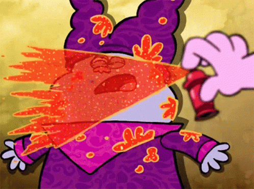 A Cartoon Character With Flames Coming Out Of His Eyes And A Purple Hat GIF