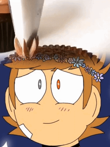 A Cartoon Character With Flowers On His Head GIF
