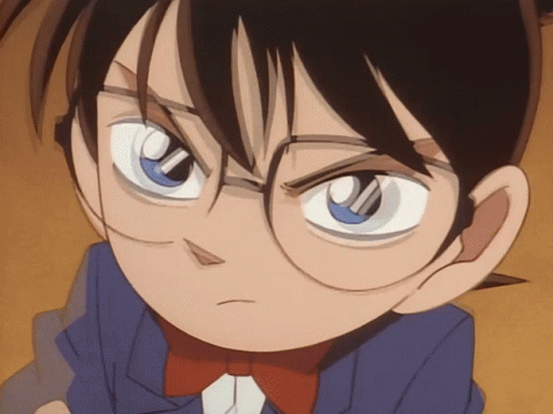 A Cartoon Character With Glasses And A Bow Tie GIF