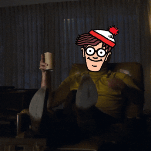 A Cartoon Character With Glasses And A Red White And Blue Hat Is Pointing At Something GIF