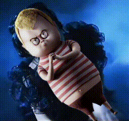 A Cartoon Character With Glasses And A Striped Shirt Is Laying Down GIF