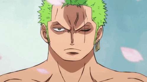 A Cartoon Character With Green Hair Is Holding A Knife In His Hand . GIF