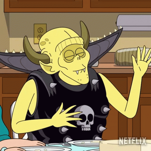 Cartoon Horned Character With Skull Shirt GIF