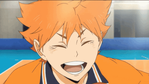A Cartoon Character With Orange Hair Is Smiling GIF