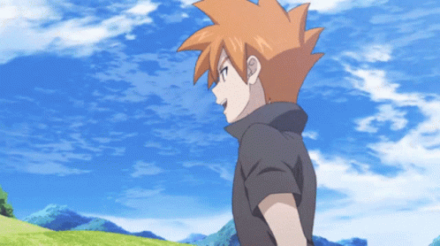 a cartoon character with orange hair is standing in a field with mountains in the background