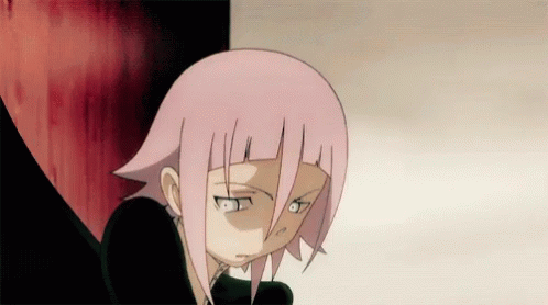 A Cartoon Character With Pink Hair And White Eyes Looks Angry GIF