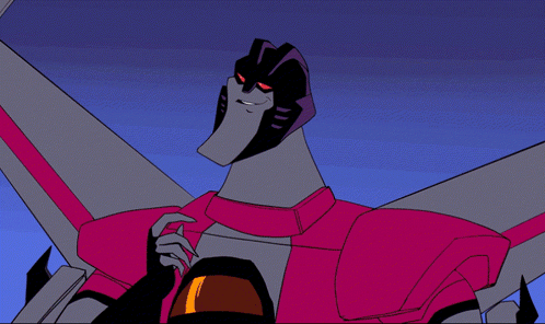 A Cartoon Character With Red Eyes And A White Smile GIF