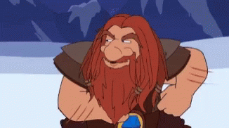 A Cartoon Character With Red Hair And A Beard Is Smiling GIF