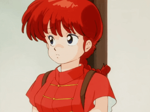 A Cartoon Character With Red Hair And A Black Wristband With The Letter N On It GIF