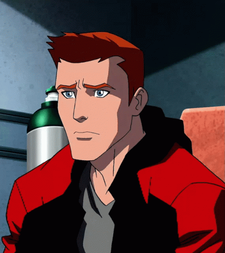 A Cartoon Character With Red Hair And Blue Eyes Is Sitting In A Chair GIF