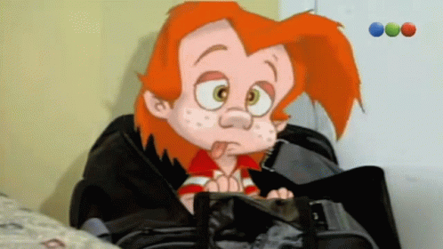 A Cartoon Character With Red Hair Is Sitting In A Black Suitcase GIF