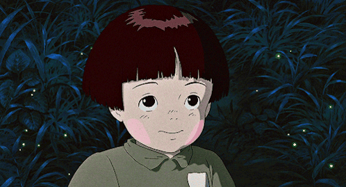 A Cartoon Character With Red Hair Is Smiling In Front Of A Dark Background GIF