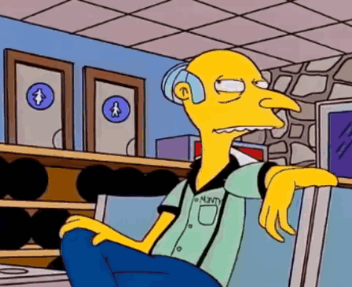 A Cartoon Character With The Name Minty On His Shirt Is Sitting In Front Of A Bowling Alley GIF