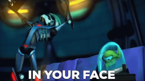 A Cartoon Character With The Words " In Your Face " On The Bottom Right GIF