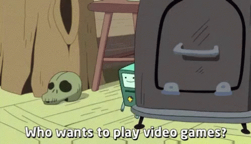 A Cartoon Character With The Words Who Wants To Play Video Games GIF