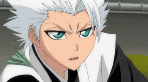 A Cartoon Character With White Hair And Blue Eyes Has A Serious Look On His Face GIF
