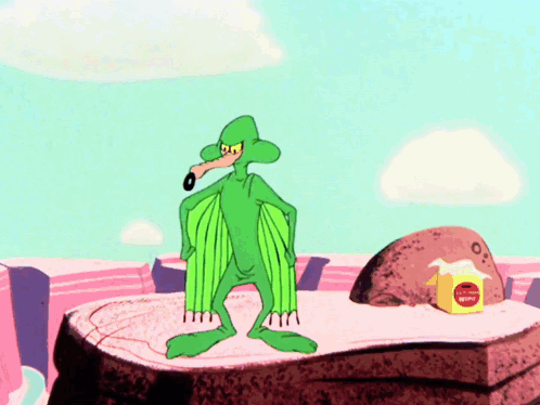 A Cartoon Character With Wings Is Standing On A Rock Next To A Box That Says ' Butter ' On It GIF