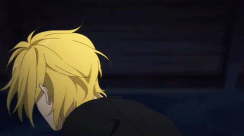 A Cartoon Character With Yellow Hair And A Black Jacket GIF