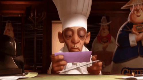 A Cartoon Chef Is Sitting At A Desk Holding A Piece Of Purple Paper . GIF