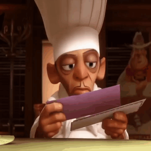 A Cartoon Chef Looks At A Piece Of Paper GIF