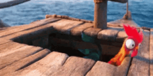 A Cartoon Chicken Is Sticking Its Head Out Of A Hole In A Wooden Dock . GIF